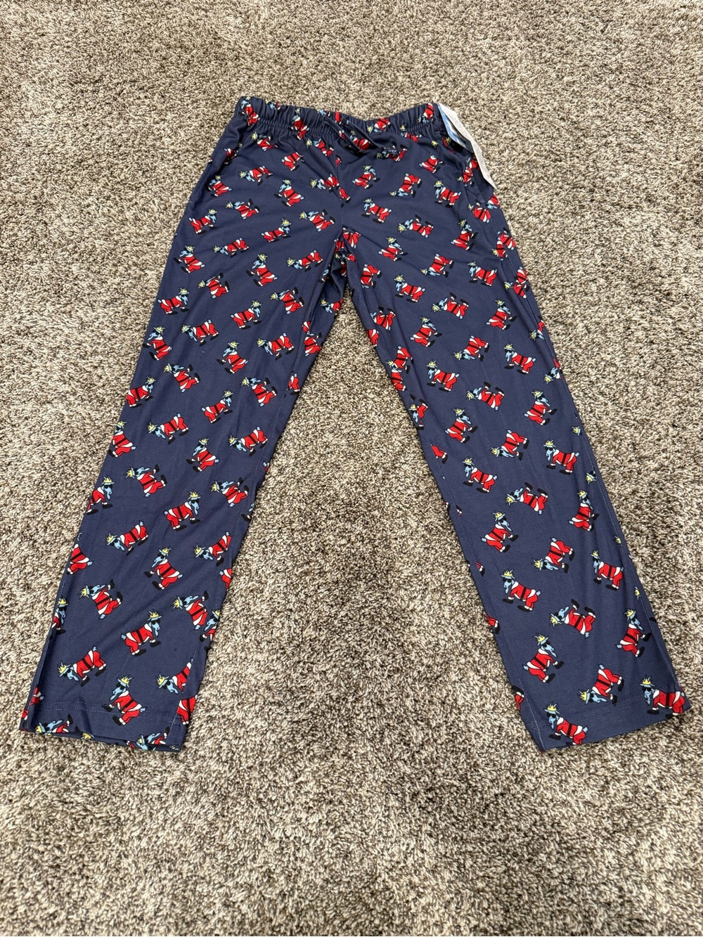 GOAT USA Santa pajama pants, Youth Medium—new with tags. Original tag price: $45